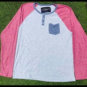 Long sleeve pocket t-shirt.